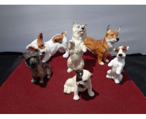 SIX BESWICK DOGS TO INCLUDE CORGI, TERRIERS ETC 