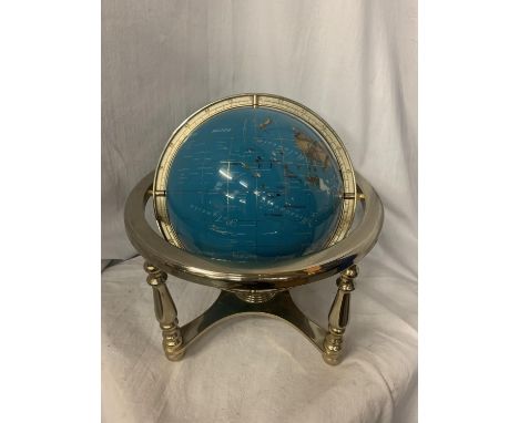 A WORLD GLOBE WITH POSSIBLY SEMI PRECIOUS STONE INLAY 