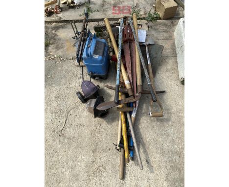 AN ASSORTMENT OF TOOLS TO INCLUDE SPADES, BRUSHES AND A MITRE SAW ETC 