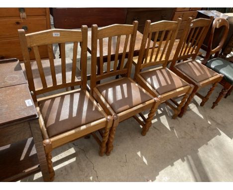 A SET OF FOUR EARLY 20TH CENTURY LIGHT OAK DINING CHAIRS ON BARLEYTWIST LEGS 