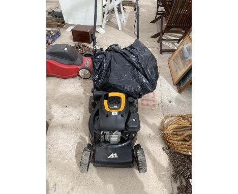 A PETROL ENGINE MCCULLOCH LAWN MOWER 