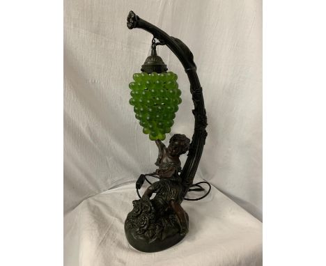 AN ORNATE VINTAGE  COMPOSITE TABLE LAMP IN THE FORM OF A YOUNG CHILD AND A SHADE IN THE FORM OF A BUNCH OF GRAPES 