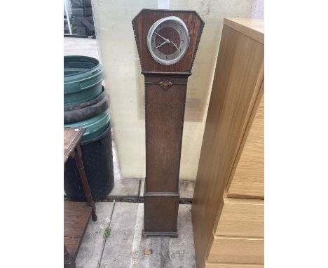 AN OAK GRANDMOTHER CLOCK 