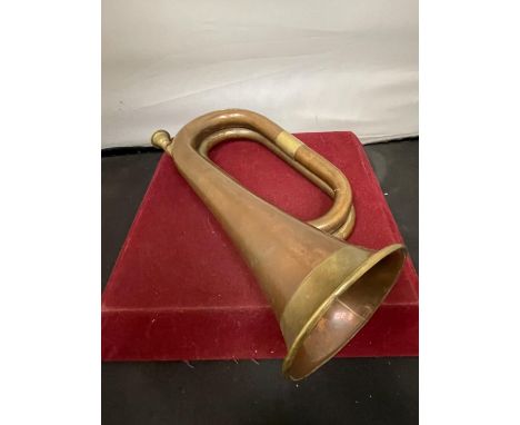 A BRASS AND COPPER BUGLE 