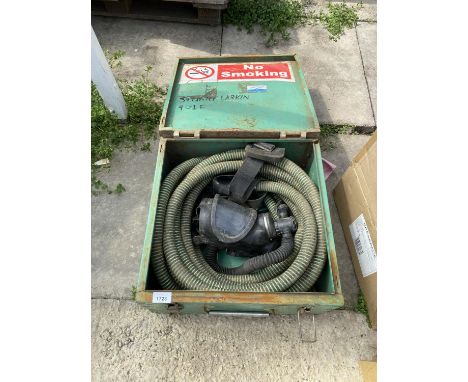 A LARGE METAL TRUNK WITH A BREATHING APERATUS 