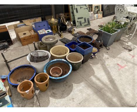 A LARGE COLLECTION OF CERAMIC AND TERRACOTTA PLANTERS 