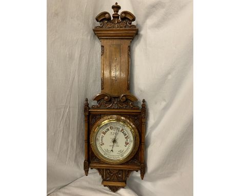 A LARGE ORNATE OAK BAROMETER 'D COHEN JEWELLERS, ALDERLEY EDGE' (MISSING THERMOMETER) L: 95CM 
