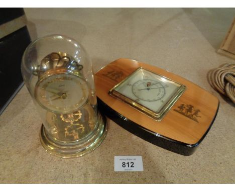 A SCHATZ SIX DAY ANNIVERSARY STYLE CLOCK AND A VINTAGE POLISHED WOOD BAROMETER 