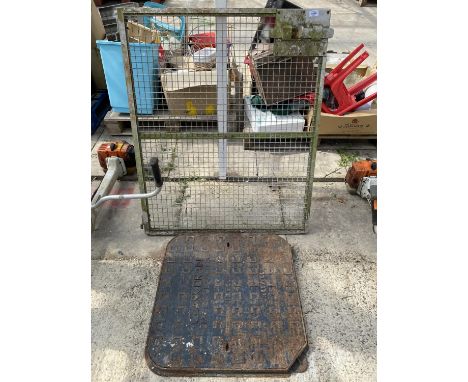 A MESH GATE WITH LATCH AND A HEAVY CAST GRID TOP 