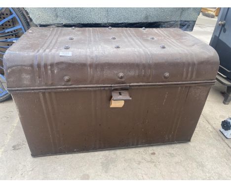 A DOME TOPPED VINTAGE METAL TRUNK 