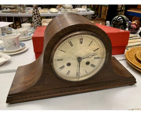 A MAHOGANY NAPOLEON'S HAT MANTEL CLOCK 