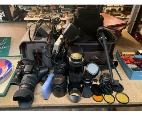 A CANON DS126071 DIGITAL CAMERA WITH VARIOUS LENSES, FILTERS, A TRIPOD AND CARRY CASES 