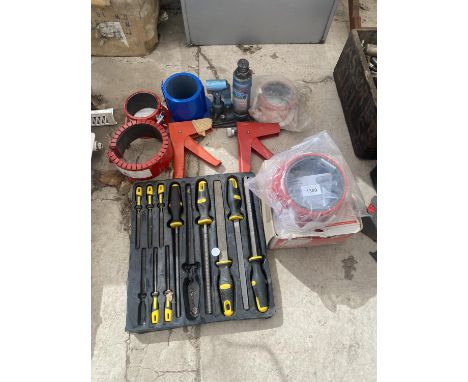 AN ASSORTMENT OF TOOLS TO INCLUDE A BOTTLE JACK, PIPE COUPLINGS AND FILES ETC 