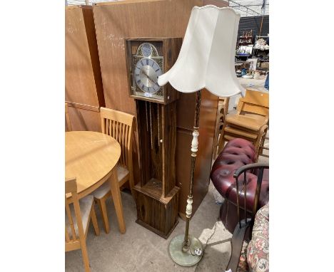 A MODERN ALARON LONGCASE CLOCK AND AN ONYX AND GLASS STANDARD LAMP 