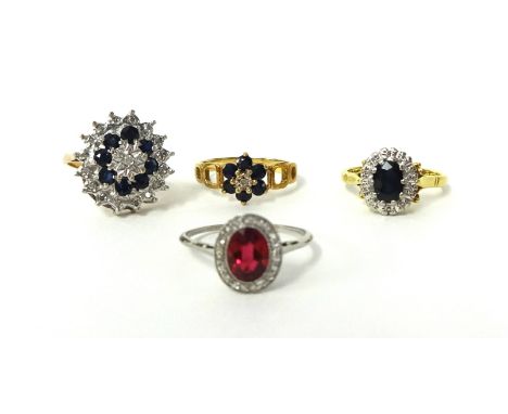 Four various dress rings including 18ct sapphire and diamond cluster, 9ct cluster and platinum and diamond ruby style ring (4