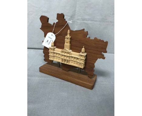 LOT OF WOODEN COLLECTABLESincluding elephants, a teak turtle, and a jade turtle