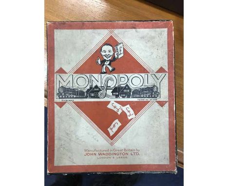 VINTAGE EDITION OF MONOPOLYalong with a boxed solitaire game, and camera