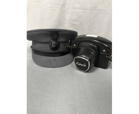 CAMERA, TORCH, MILITARY STYLE HAT AND MEASURING DEVICE