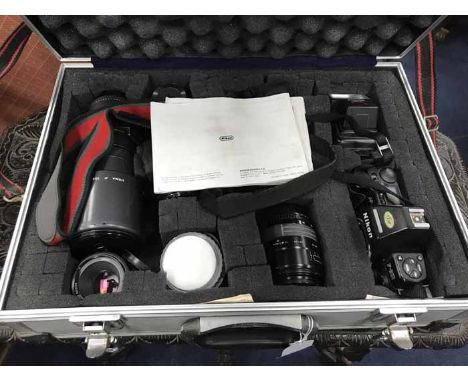 TWO NIKON CAMERAS IN FLIGHT CASEtogether with other camera accessories