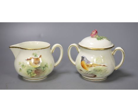 A Royal Worcester sugar bowl and cover and a cream jug painted with a Wren and a Redstart on a branch by E. Townsend, signed 