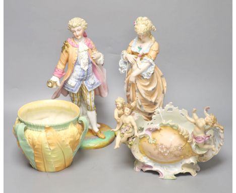 A Royal Worcester leaf-decorated vase, a Continental vase with amorini and a pair of figures of lovers (faults), tallest 29cm