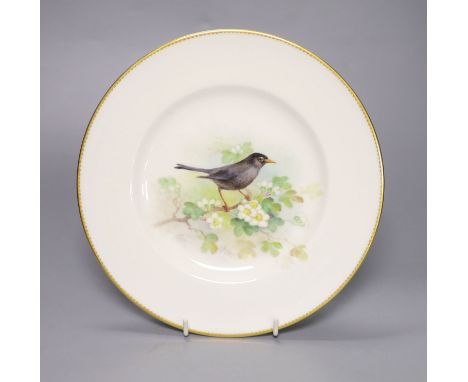 A Royal Worcester plate, painted with a blackbird on a blossoming branch by W. Powell, signed date mark 1939, diameter 23c,
