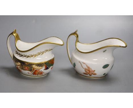A Spode cream jug painted with Imari pattern 1645 and a Spode cream jug painted with flowers and insects pattern 1025, talles