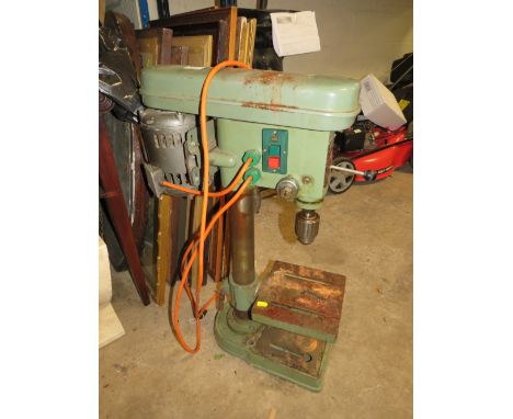 AN ULTIMAX BENCH MOUNTED PILLAR DRILL