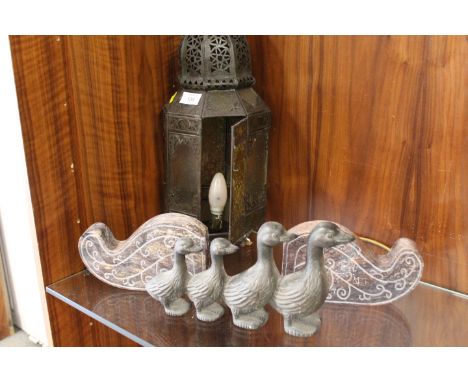 A MOROCCAN STYLE LANTERN TOGETHER WITH A DOOR STOP ETC