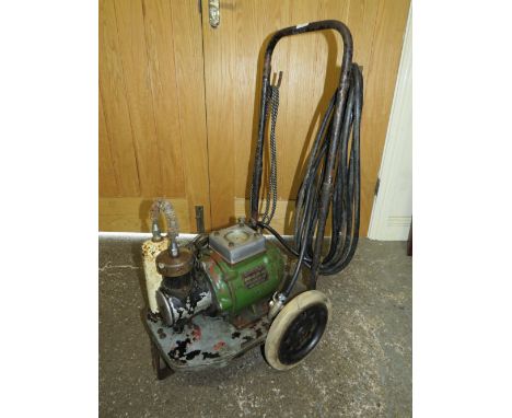 A 1950s DUNLOP TYPE NPE 2 AIR COMPRESSOR ON TROLLEY WITH AIR HOSE 240v