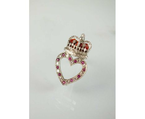 A 9ct white gold diamond, ruby and enamel heart and crown brooch, the ruby and diamond set openwork heart mounted with diamon