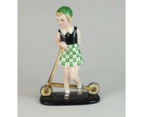 Stefan Dakon (1904-1992) for Goldscheider - An Austrian Art Deco pottery figure of a Girl with Scootermodel number 7406 / 174
