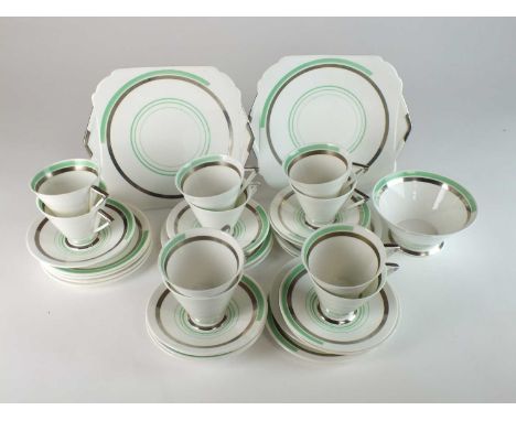 A Shelley 'Eve' shaped tea service, pattern 12133circa 1930sbanded in silver and green, the service comprising ten teacups, t