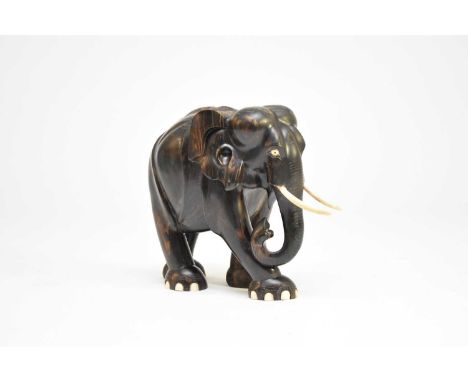 An Indian calamander figure of an elephant, second half 19th centuryStylistically modelled and standing four square with trun