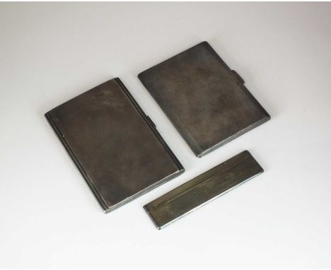 An Art Deco silver cigarette case, Herbert Bushell &amp; Son Ltd, of engine turned rectangular form, 12.5cm high, together wi