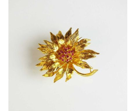 An 18ct gold ruby set flower brooch, the central 'stamen' ruby cluster set within yellow gold flower, import mark for Birming