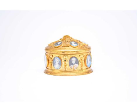A 19th century, French gilt metal oval casket, the domed lid with relief moulded floral pendants and engraved with scrolling 