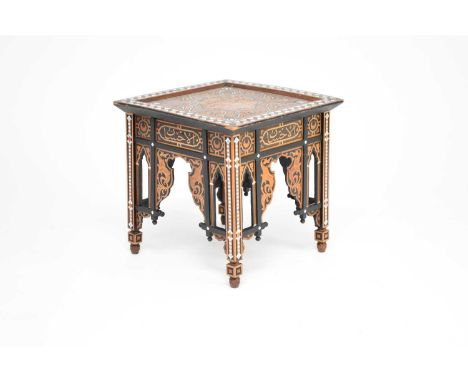 An Ottoman, square occasional table, circa 1900, possibly for Libertys, inlaid with mother-of-pearl and ebony and an Arabic i