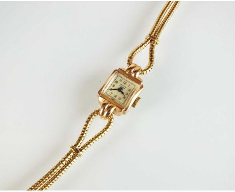 A lady's 14k gold Lathin wristwatch, the square silvered dial with gold Arabic numerals, manual wind, with attached two stran
