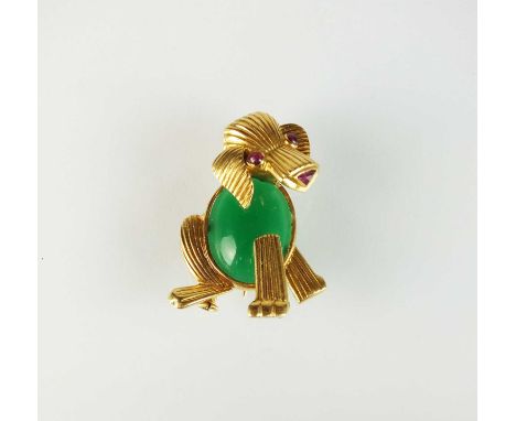 A French gold brooch in the form of a dog, designed as an oval cabochon green stone set body mounted with textured yellow gol