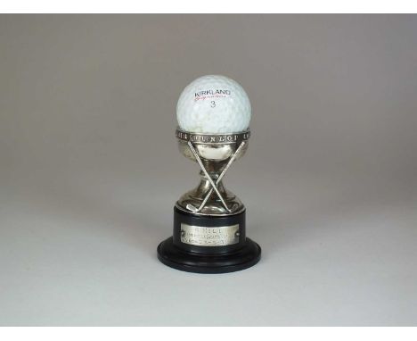 A 'hole in one' silver trophy, Elkington &amp; Co, Birmingham 1930, the pedestal cup with applied crossed silver clubs, the r