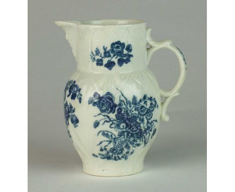 A small Caughley cabbage leaf moulded mask head jugcirca 1780transfer-printed in underglaze blue with the Bouquets pattern, u