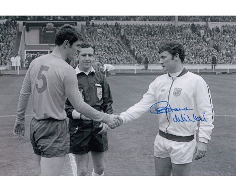 Autographed GRAHAM WILLIAMS 12 x 8 photo - B/W, depicting the West Bromwich Albion captain shaking hands with his Everton cou