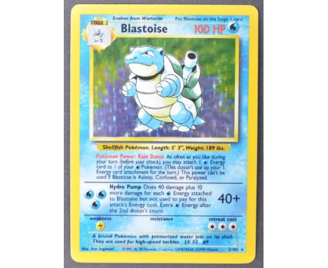 An original vintage 1990's Wizards Of The Coast Pokemon The Trading Card Game Pokemon Card 2/102 Blastoise from the original 