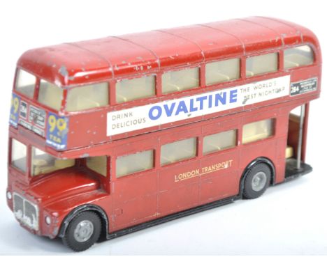 An original vintage Triang Spot On 1/42 scale diecast model No.145 London Transport Routemaster Bus having red bodywork, crea