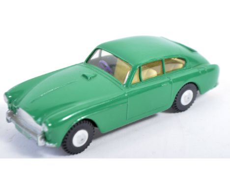 An original vintage&nbsp;Tri-ang made Spot On 1/42 scale diecast&nbsp; model No. 113 Aston Martin. Bright green body work, ap