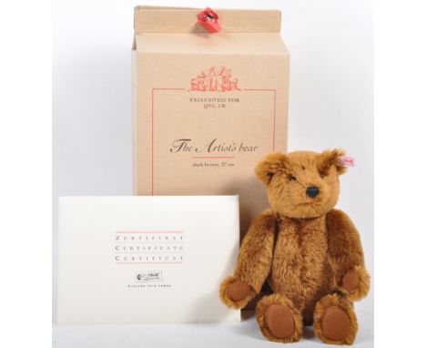 An original Limited Edition German Steiff made soft toy teddy bear ' The Artist's Bear '. The bear a dark brown short mohair 