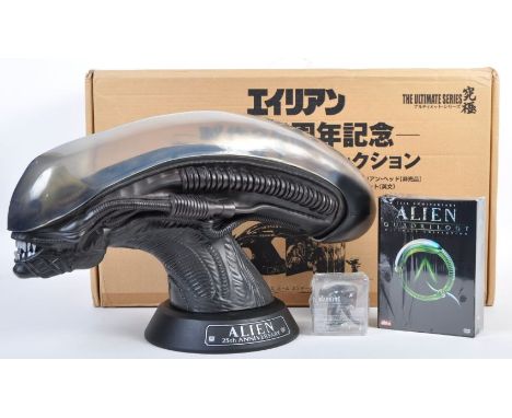 A Japanese import 25th Anniversary Edition Alien Quadrilogy DVD box set display case in the form of an Alien head. The top of