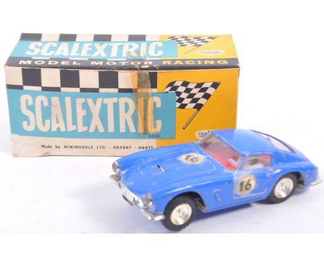 An original vintage 1960's Triang / Tri-ang made Scalextric 1/32 scale slot racing car E/4 Ferrari GT ' In blue with white #1