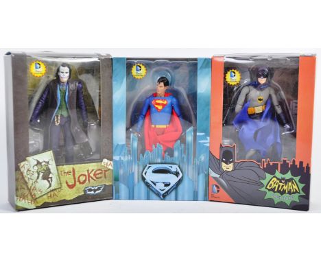 A collection of x3 Neca / Reel Toys made DC Comics Collectible boxed action figures comprising classic TV series Batman, The 